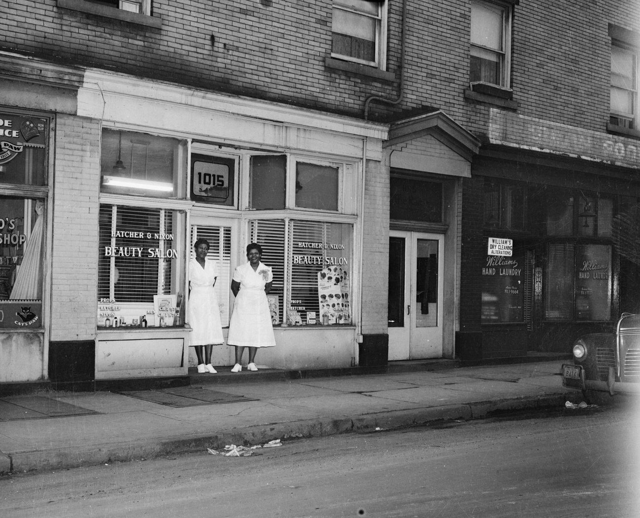 Two Women Pose Outside Hatcher & Nixon Beauty Salon, Homewood, 1951