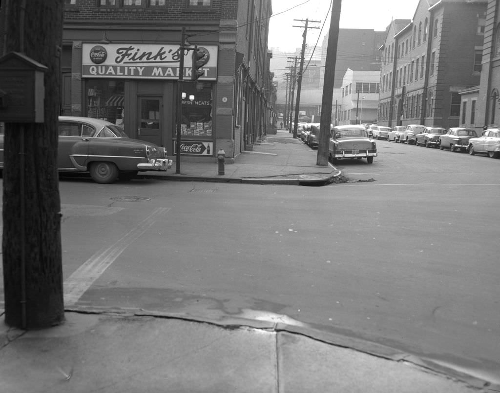 South 22nd Street at the intersection with Sarah Street featuring Fink's Quality Market, 1956