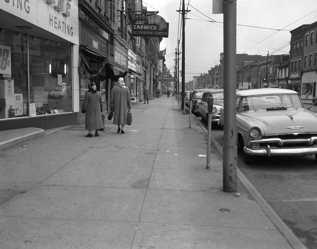 Local businesses on the 1700 block of East Carson Street including Joe Zarnich Accordion Center, 1957