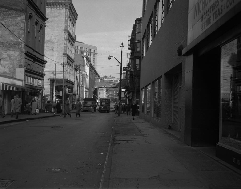 Fourth Avenue towards Market Square and Fourth Avenue Hotel with Diamond Market archway in distance, 1954