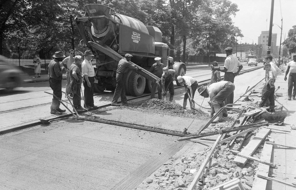 Workers repaving Highland Avenue near Peabody High School and Pittsburgh Theological Seminary, 1951.