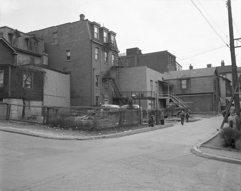 Children watching construction on Amanda Street near Rochell, 1954.