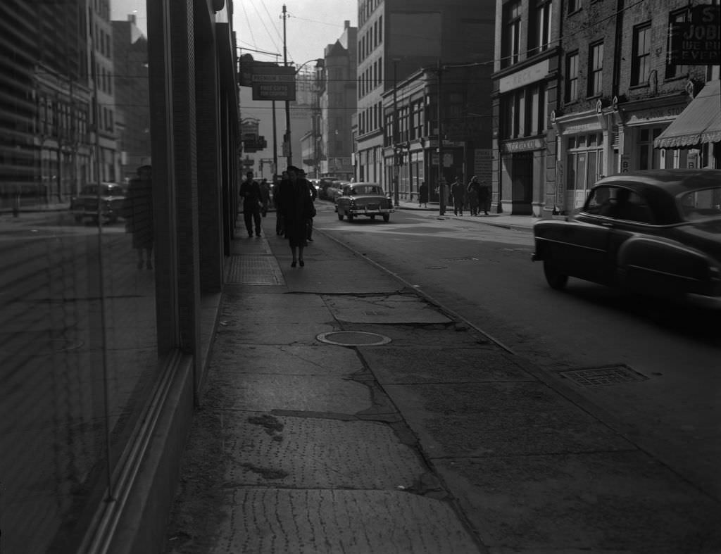 Fourth Avenue looking south, featuring Shoyer's Bookstore and other businesses, 1954