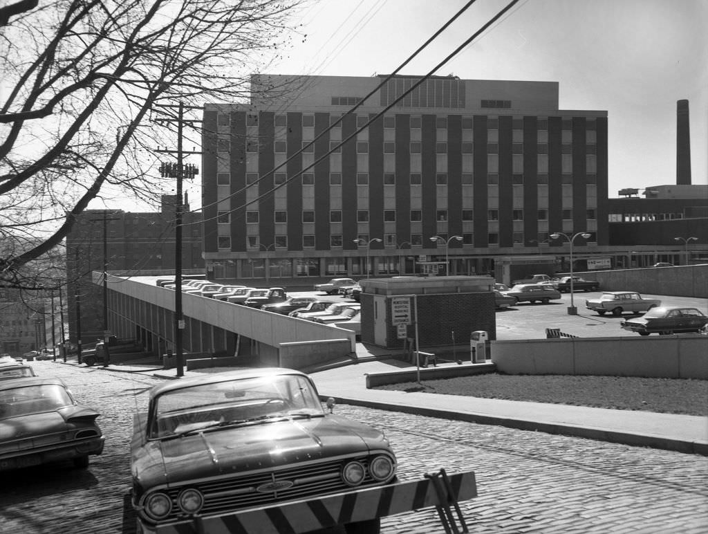 Montefiore Hospital entrance and parking lot, 1966.