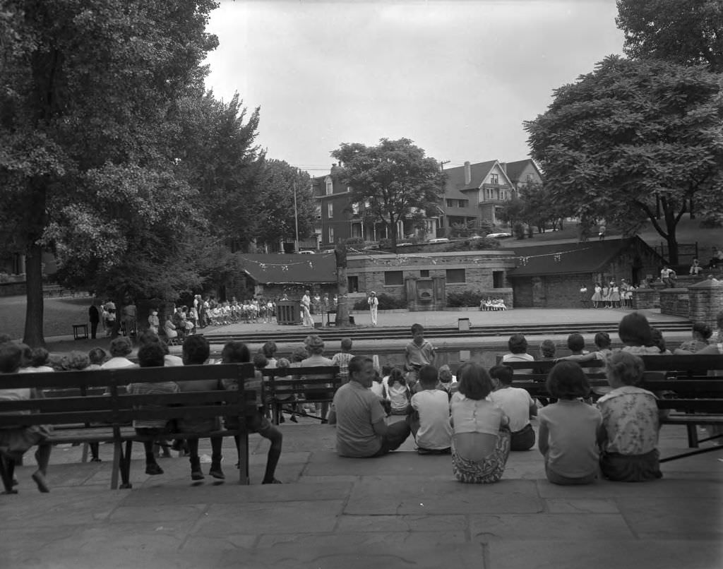 Fun Day at Arsenal Park, spectators watching a show, 1961.