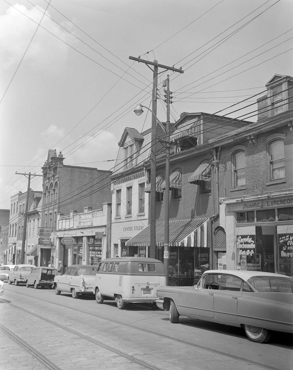 Centre Avenue, features Snooks Luncheonette and Lee's Florist, 1960.