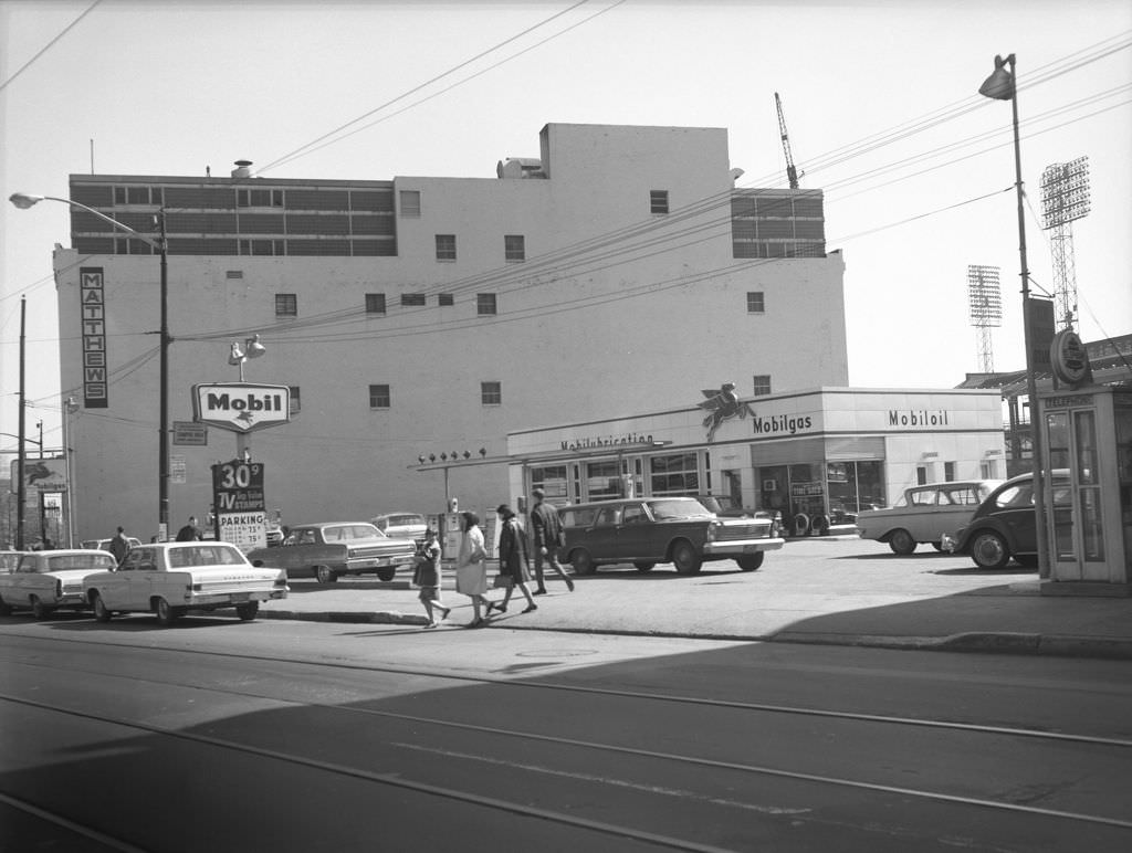 Matthew's Building in Oakland: Mobile gas station and Forbes Field lights in the distance, 1966.