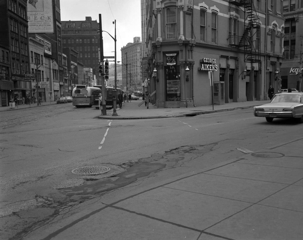 Liberty Avenue meets Seventh Avenue, view of upcoming George Aiken's restaurant at the intersection, 1971.