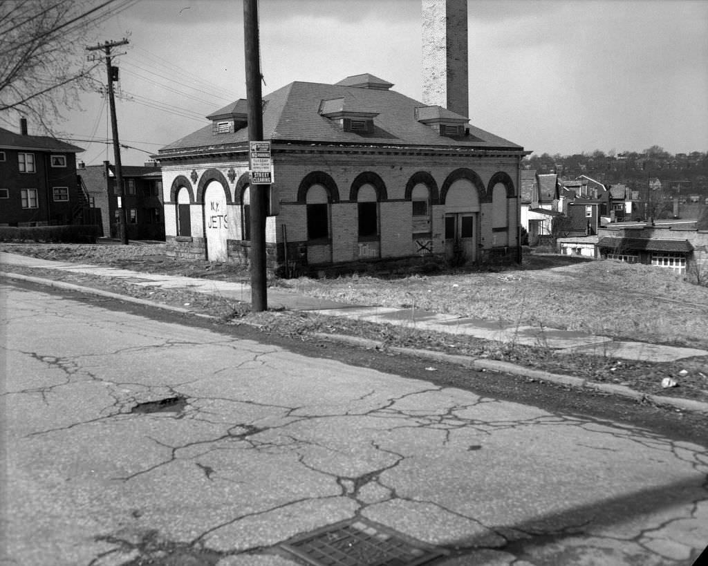 Old Lincoln Pumping Station, now Paulson Community Recreation Center, showing graffiti and boarded windows, 1971.