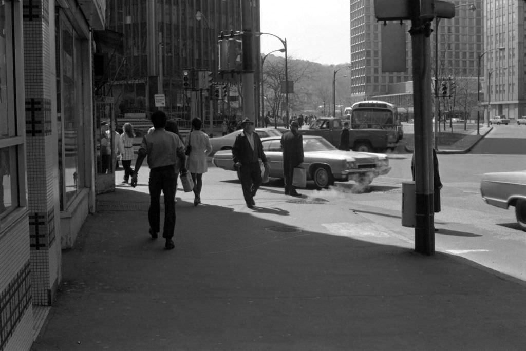 Liberty Avenue and Stanwix Street intersection bustling with pedestrians and commerce, 1972.