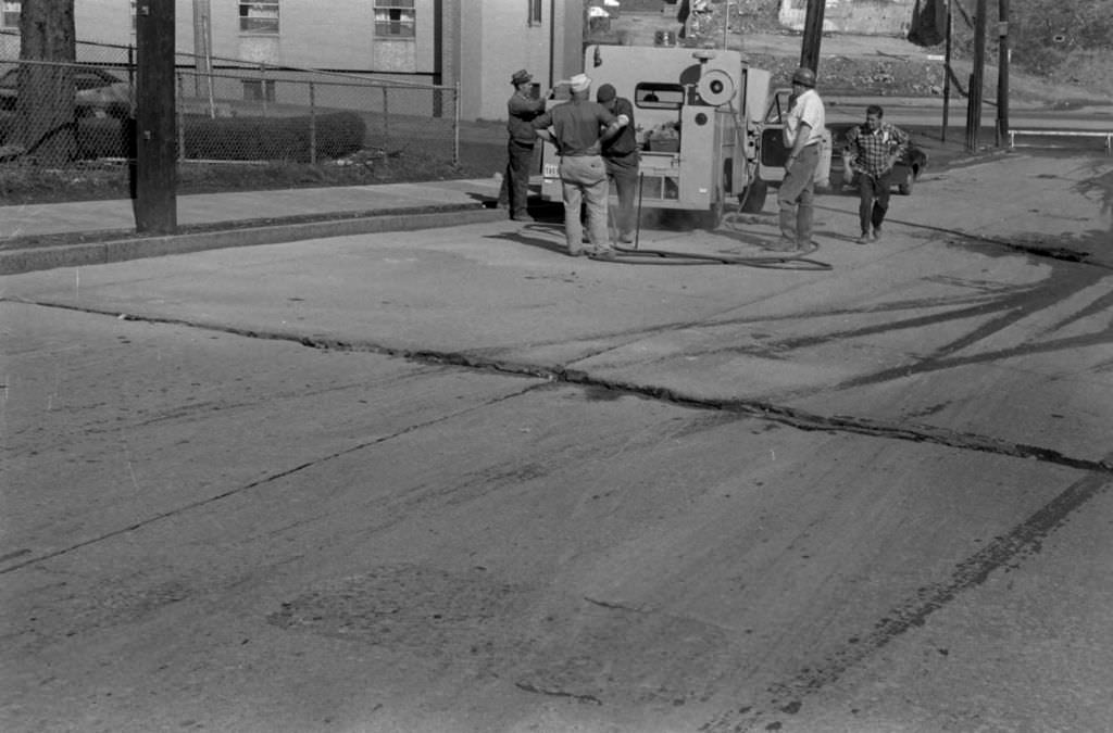 Cleanup of water main break on Morgan Street near Centre Avenue, 1972.