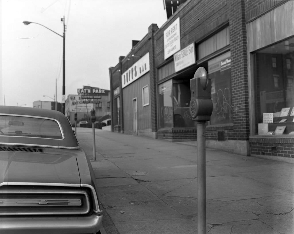 Graffitied commercial property and local bar on Penn Avenue, 1970.