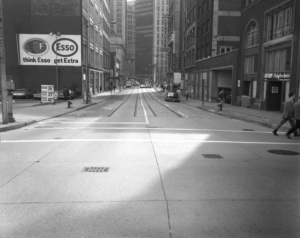 7th Street featuring an Esso gas station and Century Building, 1970.