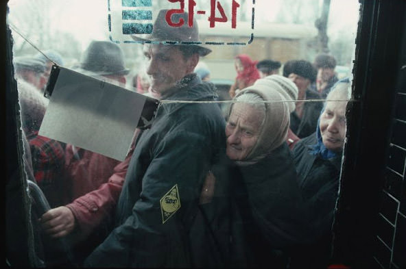 Crowd gathering outside bakery, Kiev, Ukraine, 1991