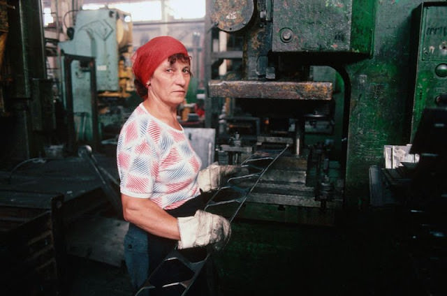 A worker operates a press at the Lviv Bus Plant (Lvivsky Avtobusny Zavod, or LAZ), Lviv, Ukraine, 1991