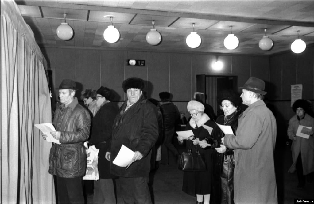 Voters wait patiently to cast their ballots at the Kalinin mine in Donetsk, eastern Ukraine.