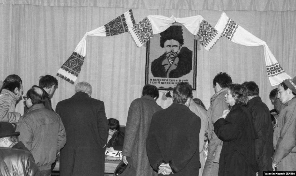 Under the watchful gaze of Taras Shevchenko, voters cast their ballots. Shevchenko's literary legacy is widely regarded as the bedrock of modern Ukrainian literature and, to a large extent, the modern Ukrainian language.