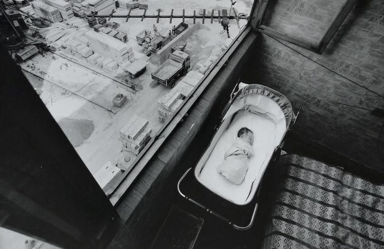 Iliya, the son of Irina and Dmitri, sleeping by the window, May 1994. He was 5 days old at the time. The following week, Iliya tragically died from meningitis, a devastating shock for his parents and family. They went on to have several more children.