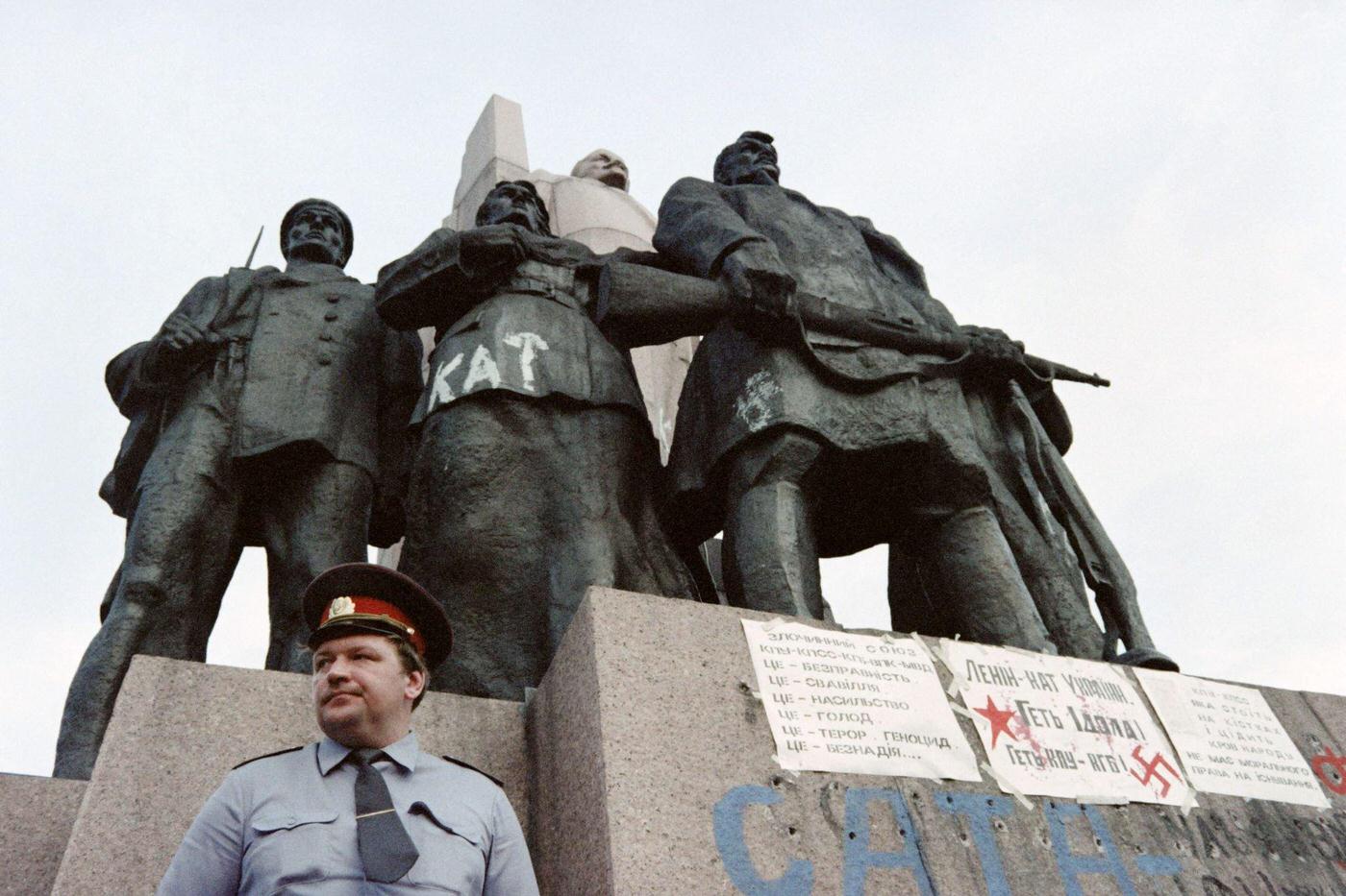 Policeman Guards Lenin Monument in Kiev After Independence, 1991