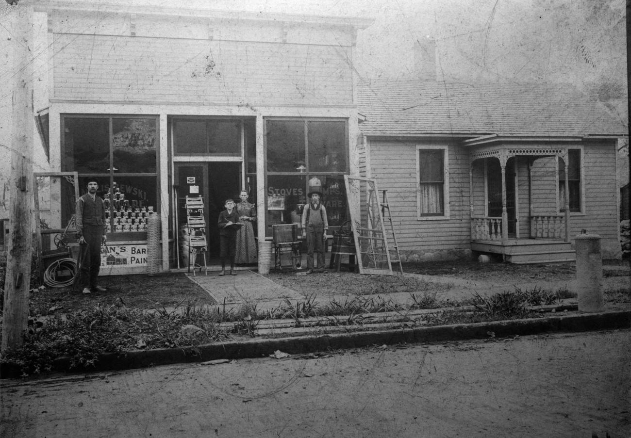 Family at Hardware Store Entrance, USA, 1900