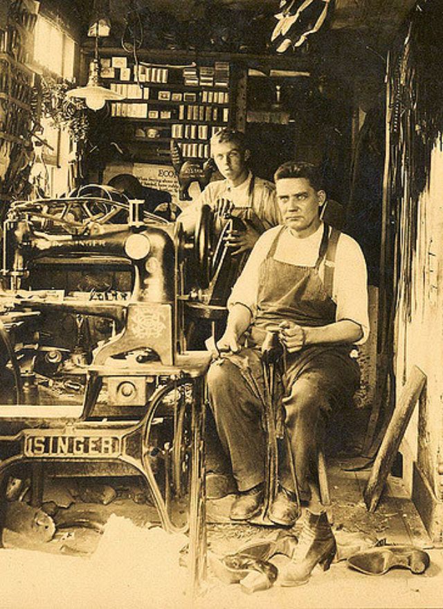 Father and son in their shoe repair shop, Unionville, Connecticut