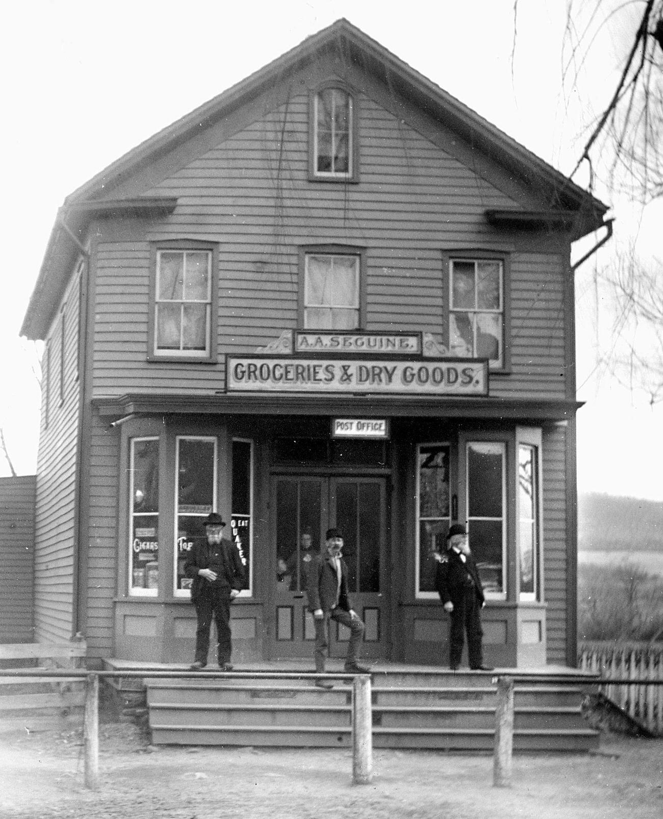 Men on Grocery Store Porch, 1900