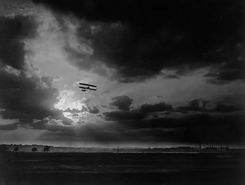 An early biplane in flight. France, 1910.