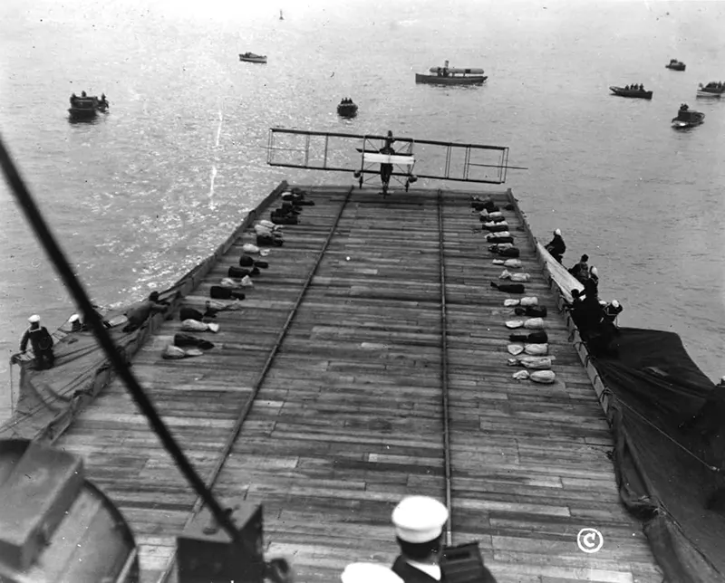 A biplane landing on the USS Pennsylvania.