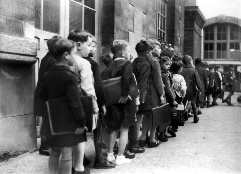 During World War II, Parisian students line up a courtyard on the first day of classes