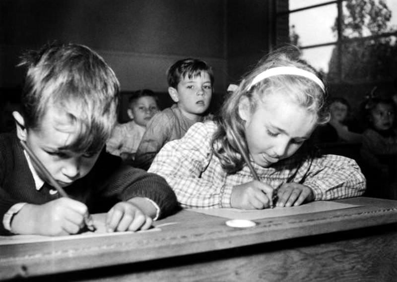 Children hard at work on Sept. 15, 1959