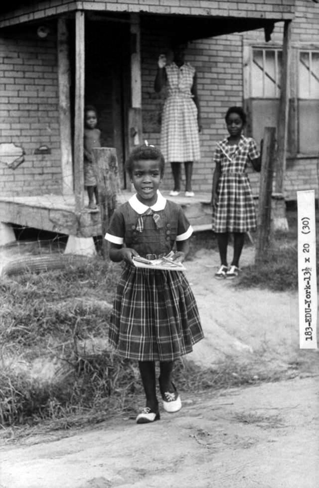 Delores York heads off for her first day at a previously all-white school in September 1960 in Arkansas