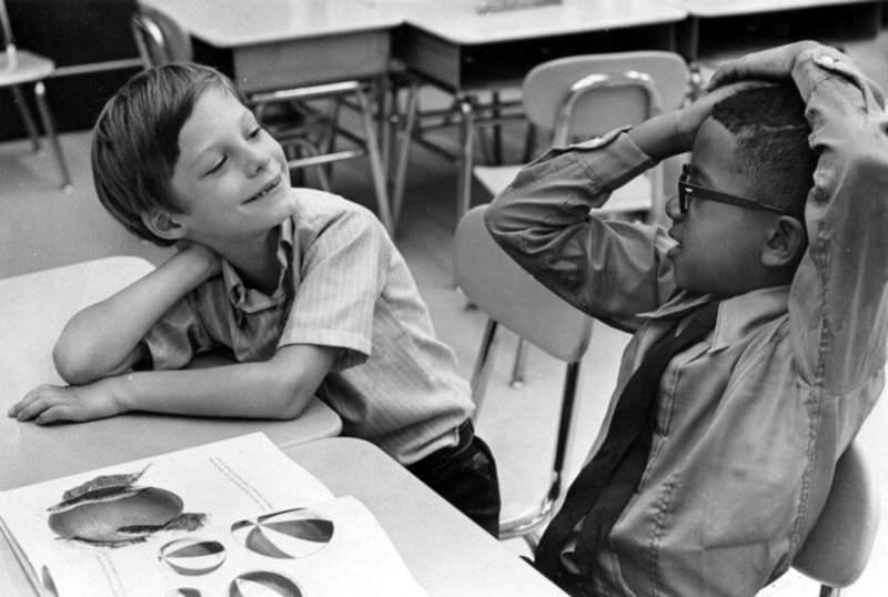 Jim Hard (left) of Framingham, Massachusetts, gets acquainted with Joseph Reis of the Roxbury neighborhood at the Trotter School in Boston on Sept. 3, 1969