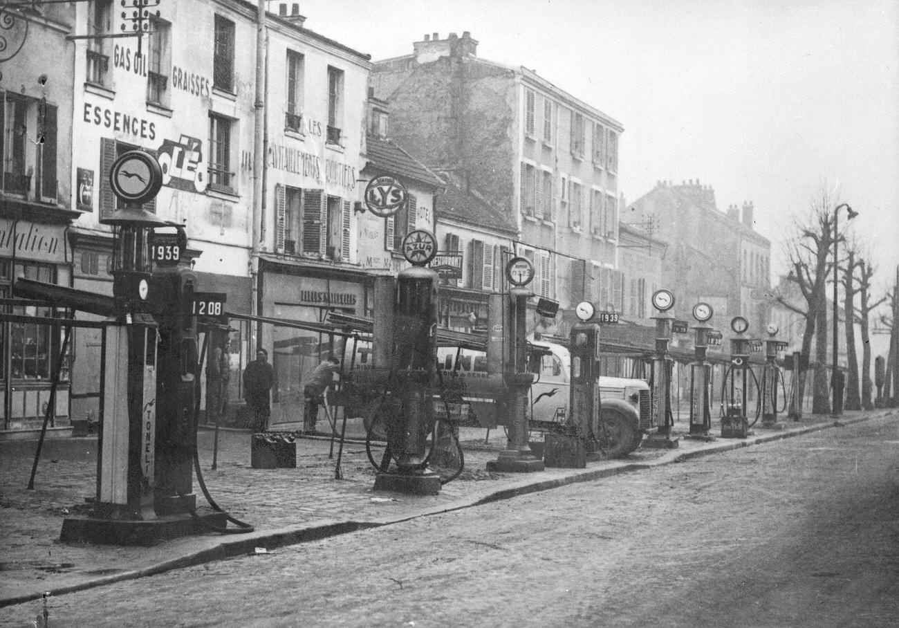 Resupplying at a petrol station in Paris, 1947.