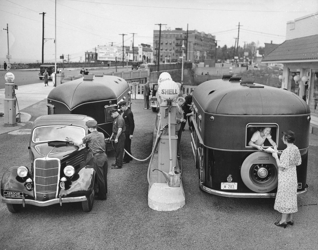 Trailers serviced at a gas station in New Jersey, 1950s