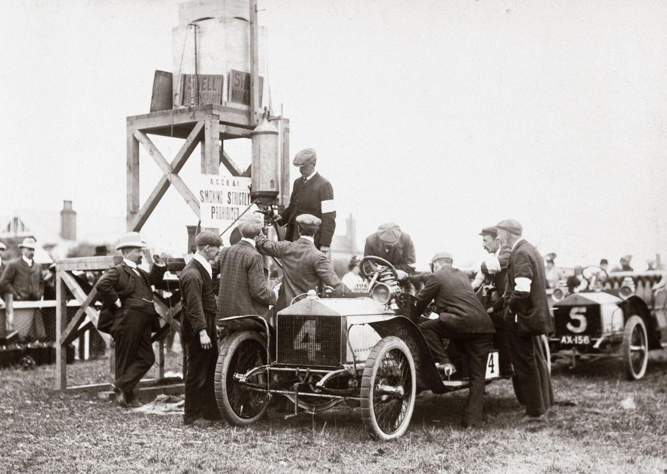Automobile Club Meeting in the UK with Cars at a Petrol Pump, 1904