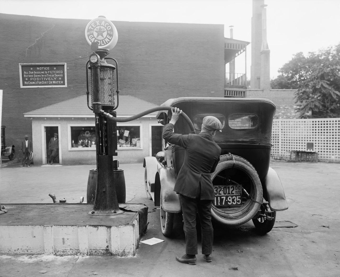 Man Filling Up Car at Washington DC Gas Station, 1920
