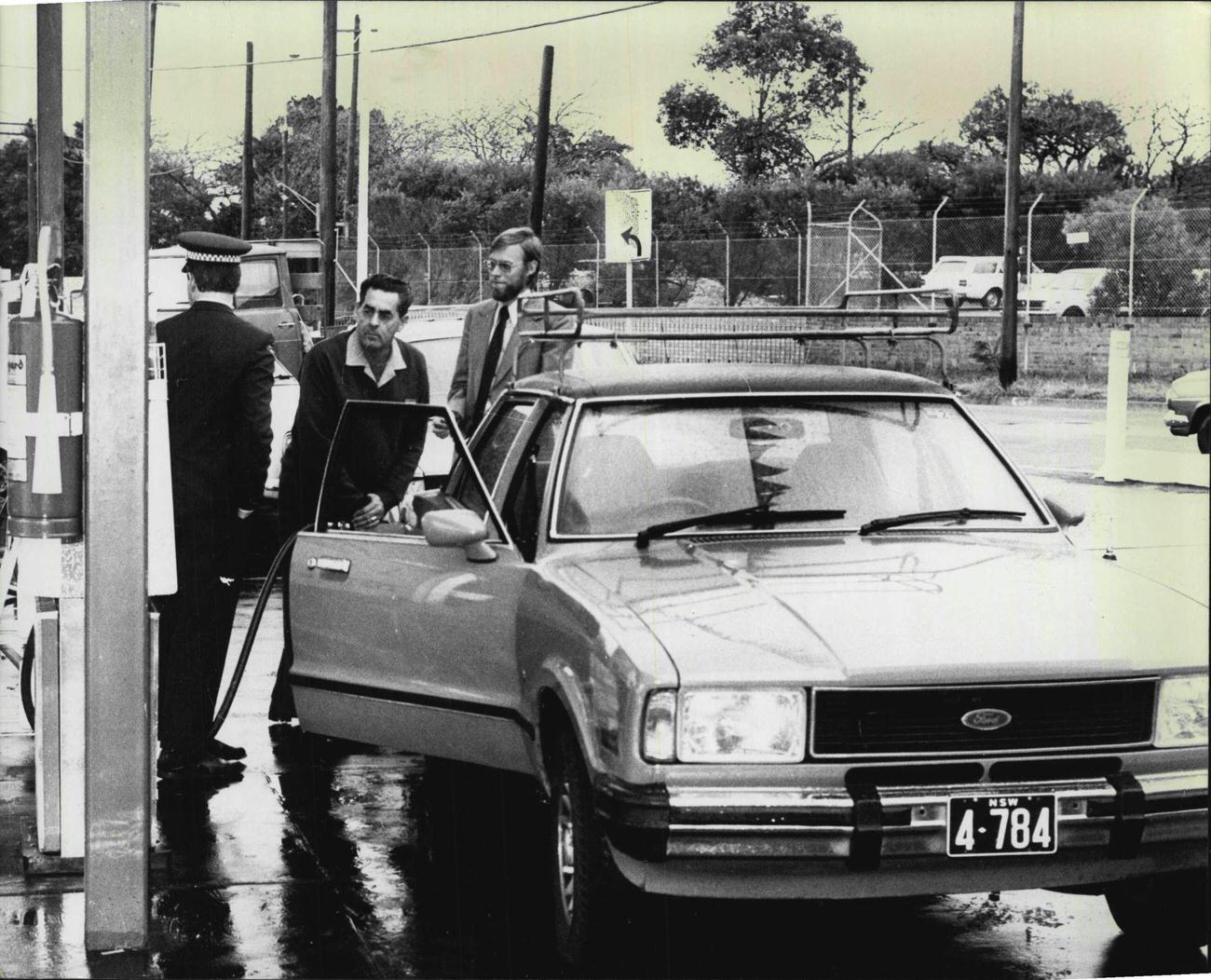 Police-Supervised Refueling at Total Self-Service Station in Alison Road