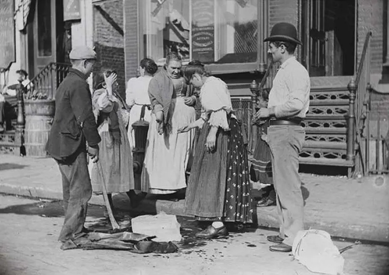 The iceman typically delivered to apartments, but this block of ice was left on Mulberry Bend in 1897, in New York.