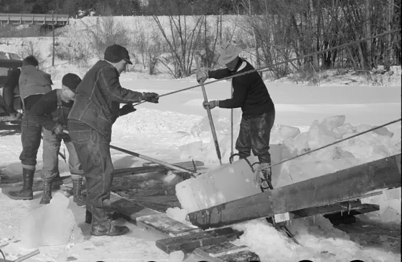 A photograph that captures the ice cutting process on the Ottauquechee River in 1936.