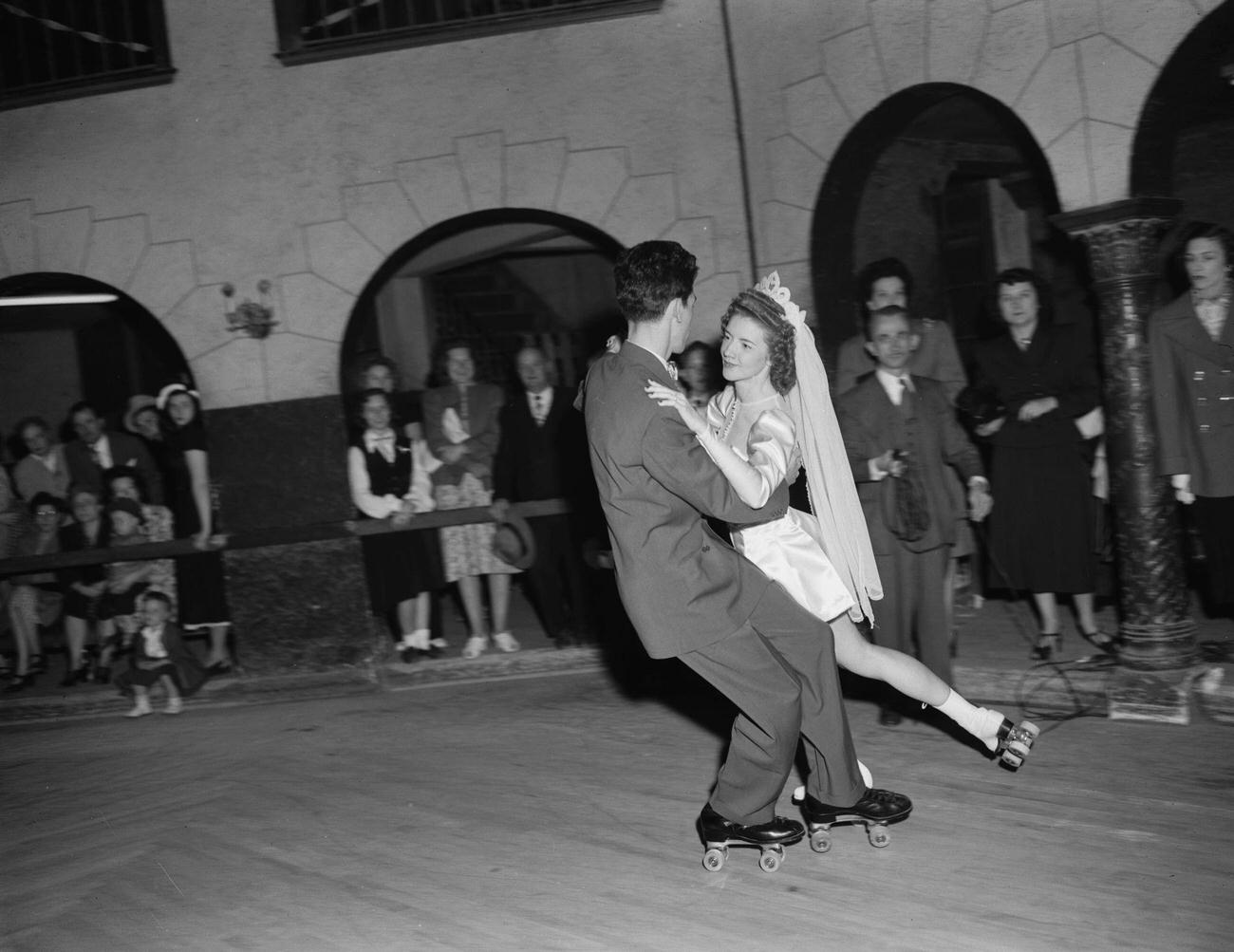 Bride and Groom Wearing Roller Skates at Their Wedding, USA, circa 1950