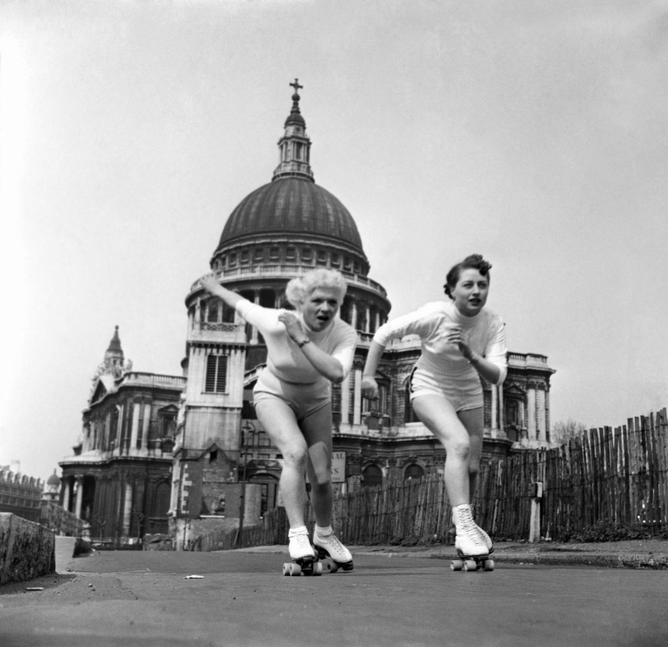 Patricia Barnett and Giselle Detrey Roller Skate to Work by St. Paul's Cathedral, 1953