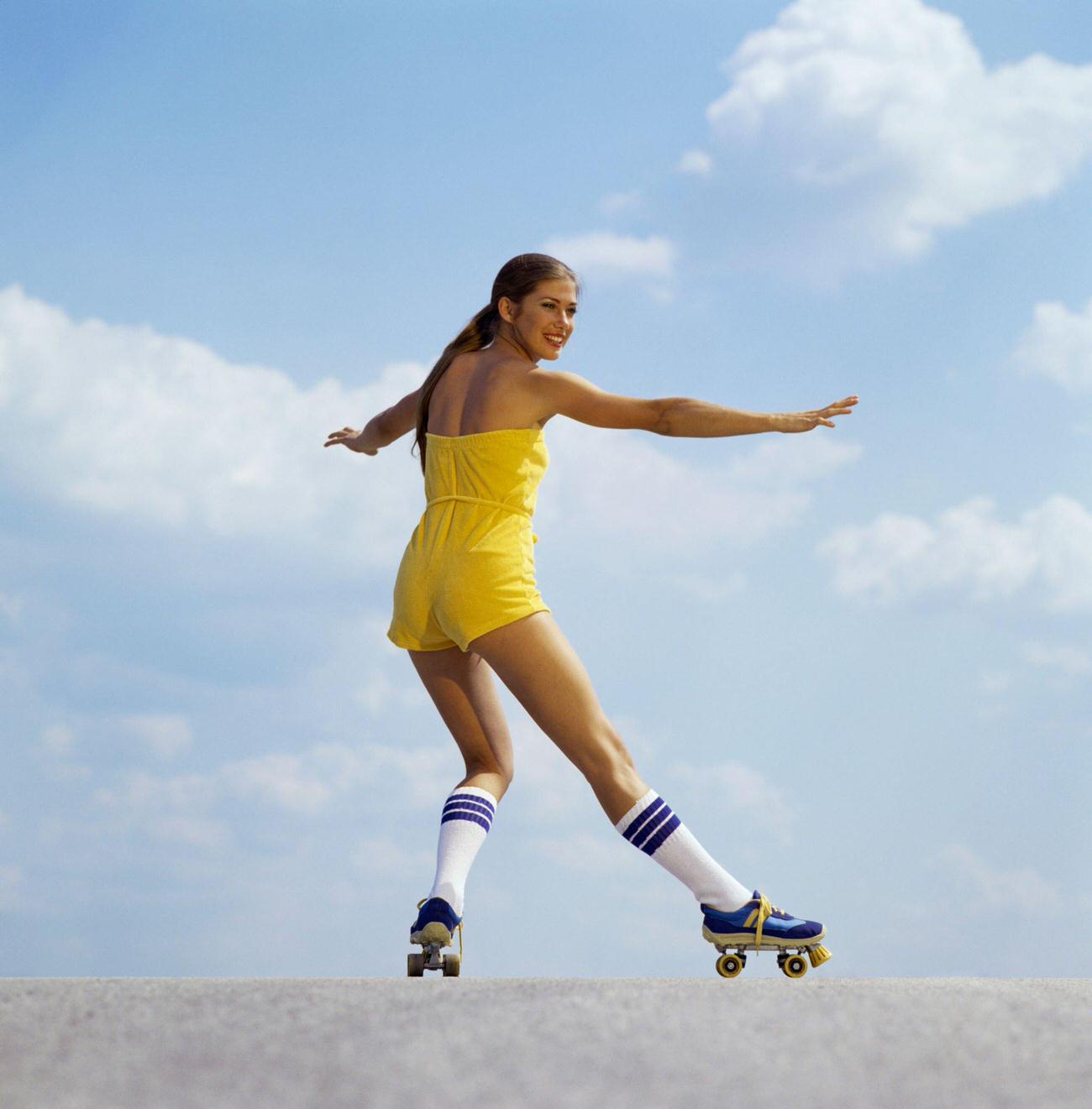 Woman Wearing Jumpsuit While Roller Skating