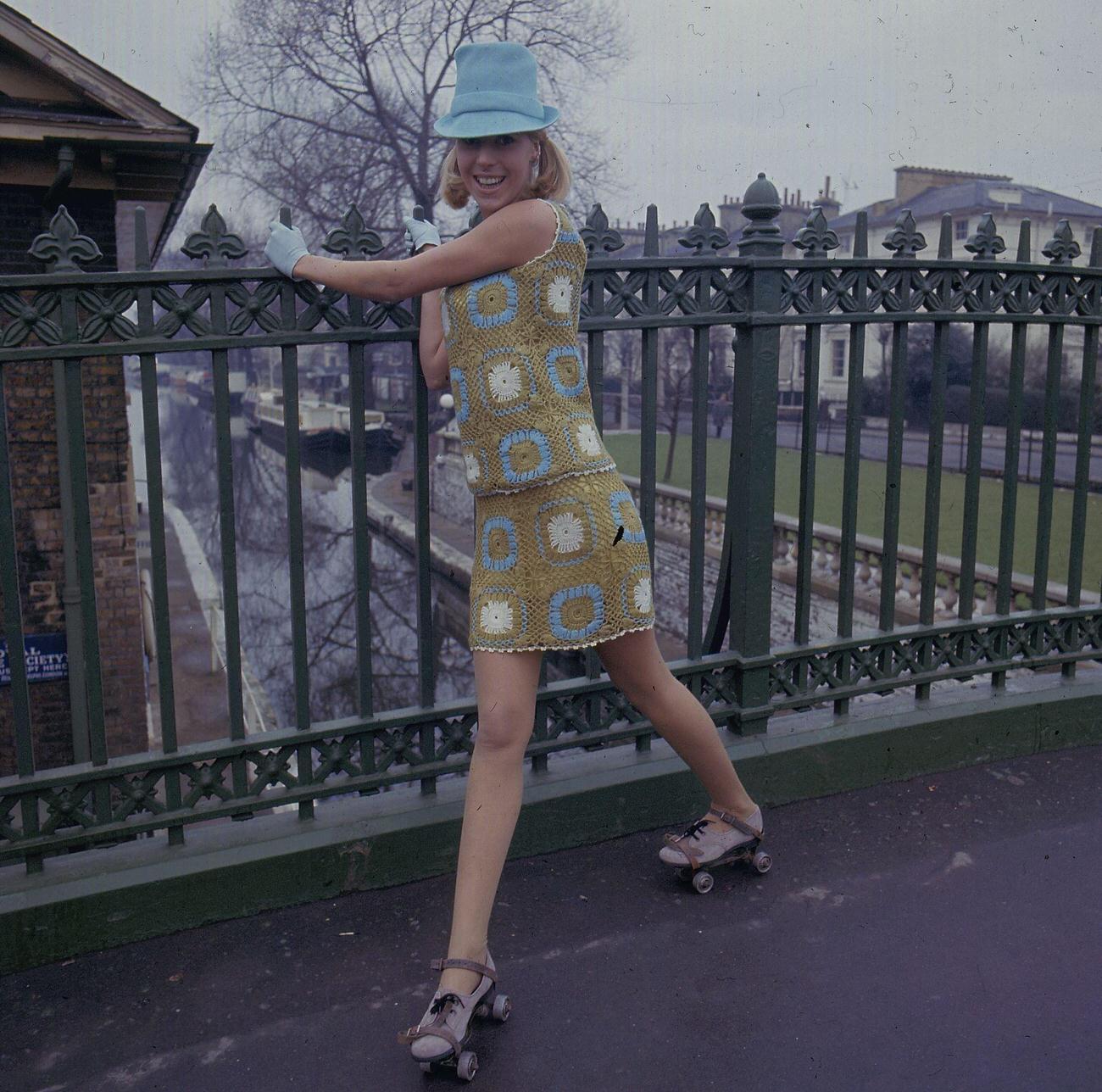 Model in Crochet Knit Outfit Roller Skating on Bridge, 1967