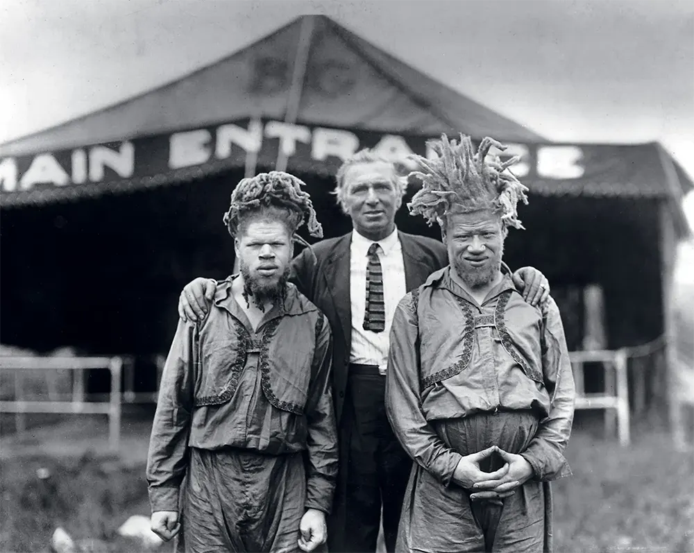 The Muse brothers: Willie (left) and George with showman Al G Barnes, 1918-22.