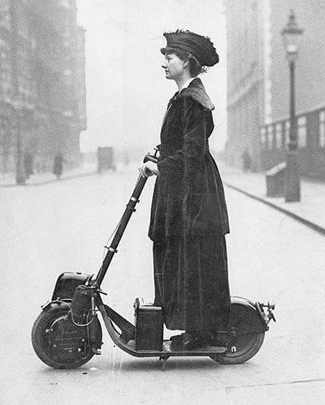 Woman on Early Electric Scooter, 1916