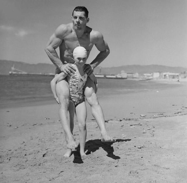 Patricia O’Keefe Gives 200-pound Man a Piggyback Ride, 1940