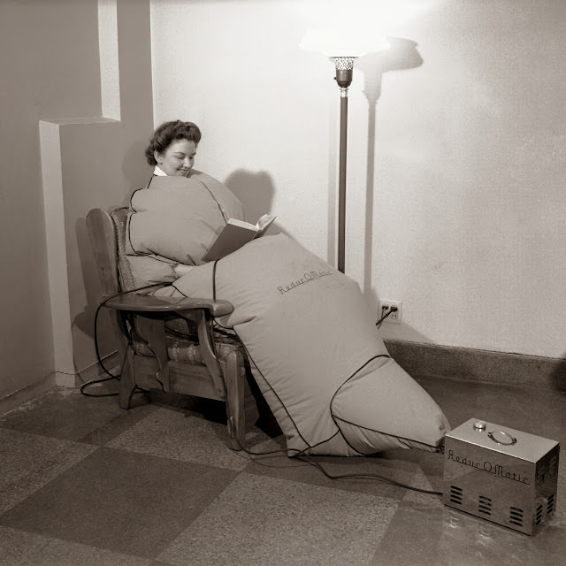 Gail King Demonstrates a Portable Sweat Box During Rubber Shortage, 1942