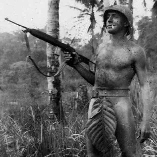 US Marine Poses in the Pacific Islands, 1940s