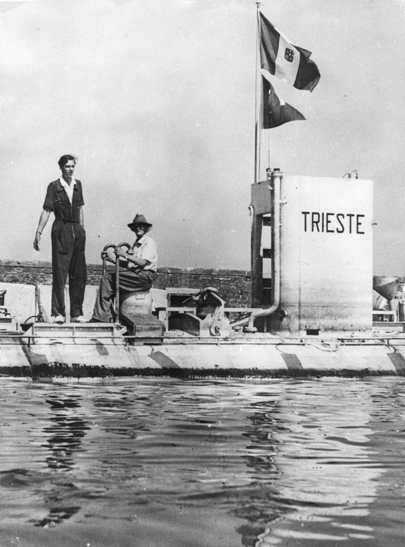 Auguste Piccard with son Jacques aboard Bathysphere 'Trieste' after a descent, 1953.