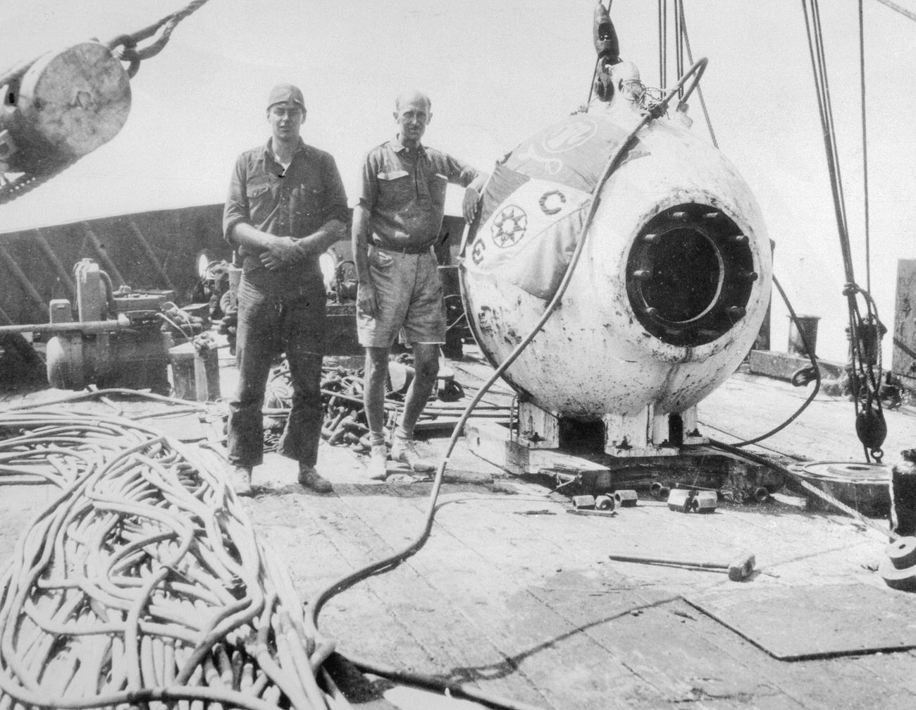 William Beebe and Otis Barton in bathysphere during undersea explorations off Nonsuch Island, Bermuda.